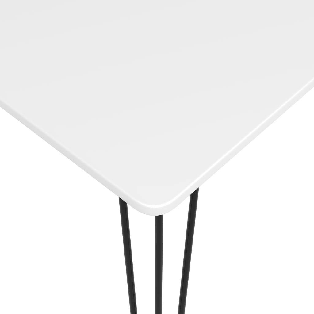 white top table with black thin legs