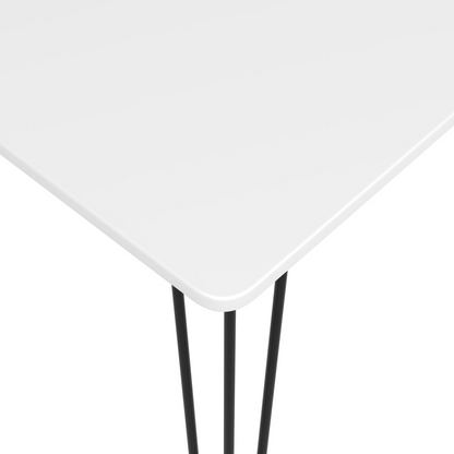 white top table with black thin legs